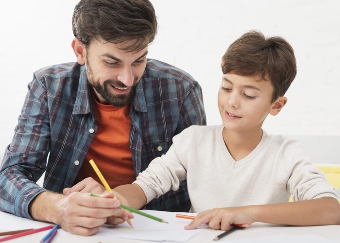 father-helping-son-with-homework
